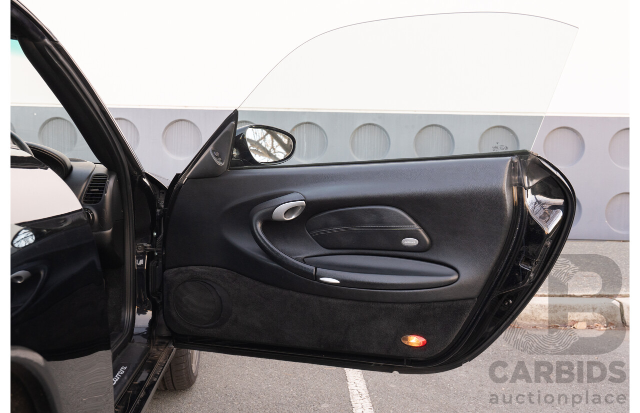 2/2003 Porsche 911 Carrera 996 2d Cabriolet Black 3.6L