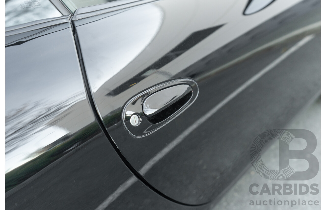 2/2003 Porsche 911 Carrera 996 2d Cabriolet Black 3.6L