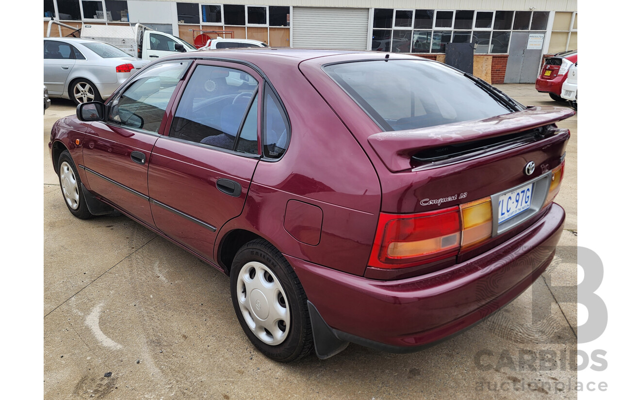 5/1999 Toyota Corolla Conquest SECA AE102R 5d Liftback Maroon 1.8L