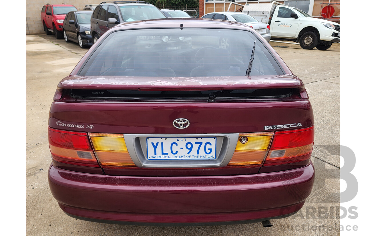 5/1999 Toyota Corolla Conquest SECA AE102R 5d Liftback Maroon 1.8L