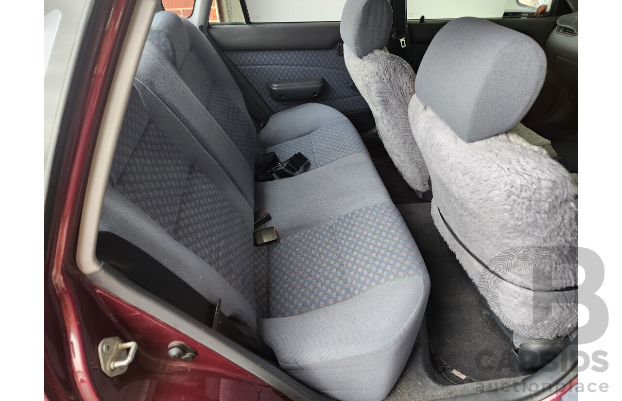 5/1999 Toyota Corolla Conquest SECA AE102R 5d Liftback Maroon 1.8L