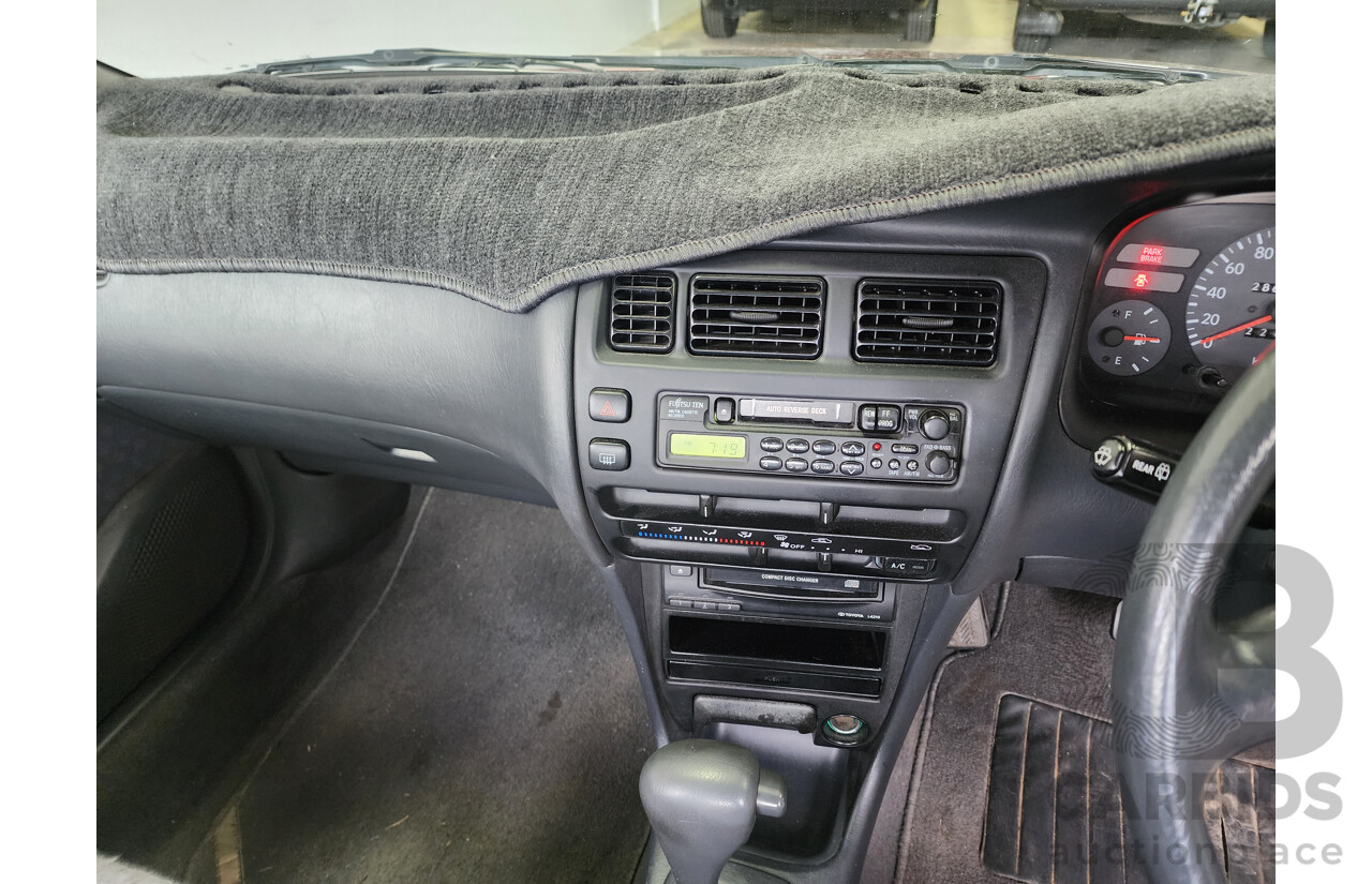 5/1999 Toyota Corolla Conquest SECA AE102R 5d Liftback Maroon 1.8L