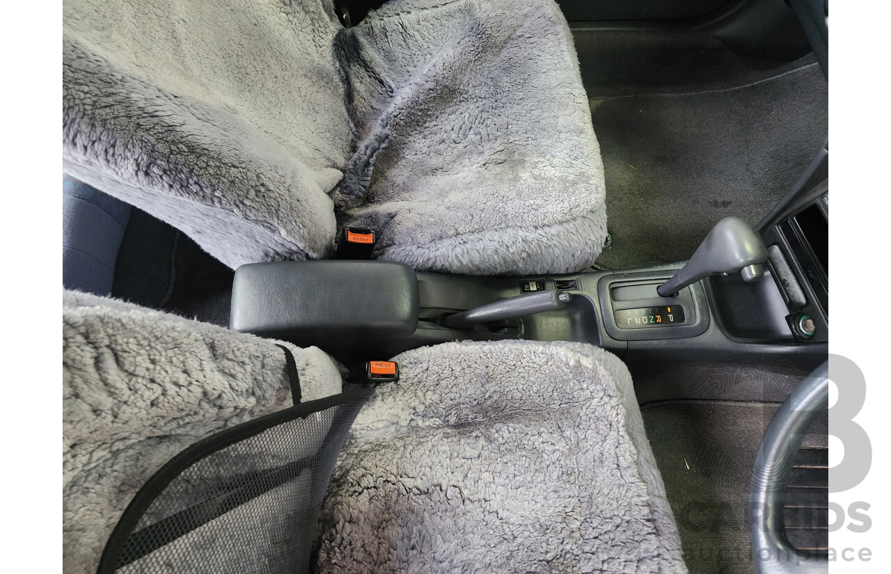 5/1999 Toyota Corolla Conquest SECA AE102R 5d Liftback Maroon 1.8L