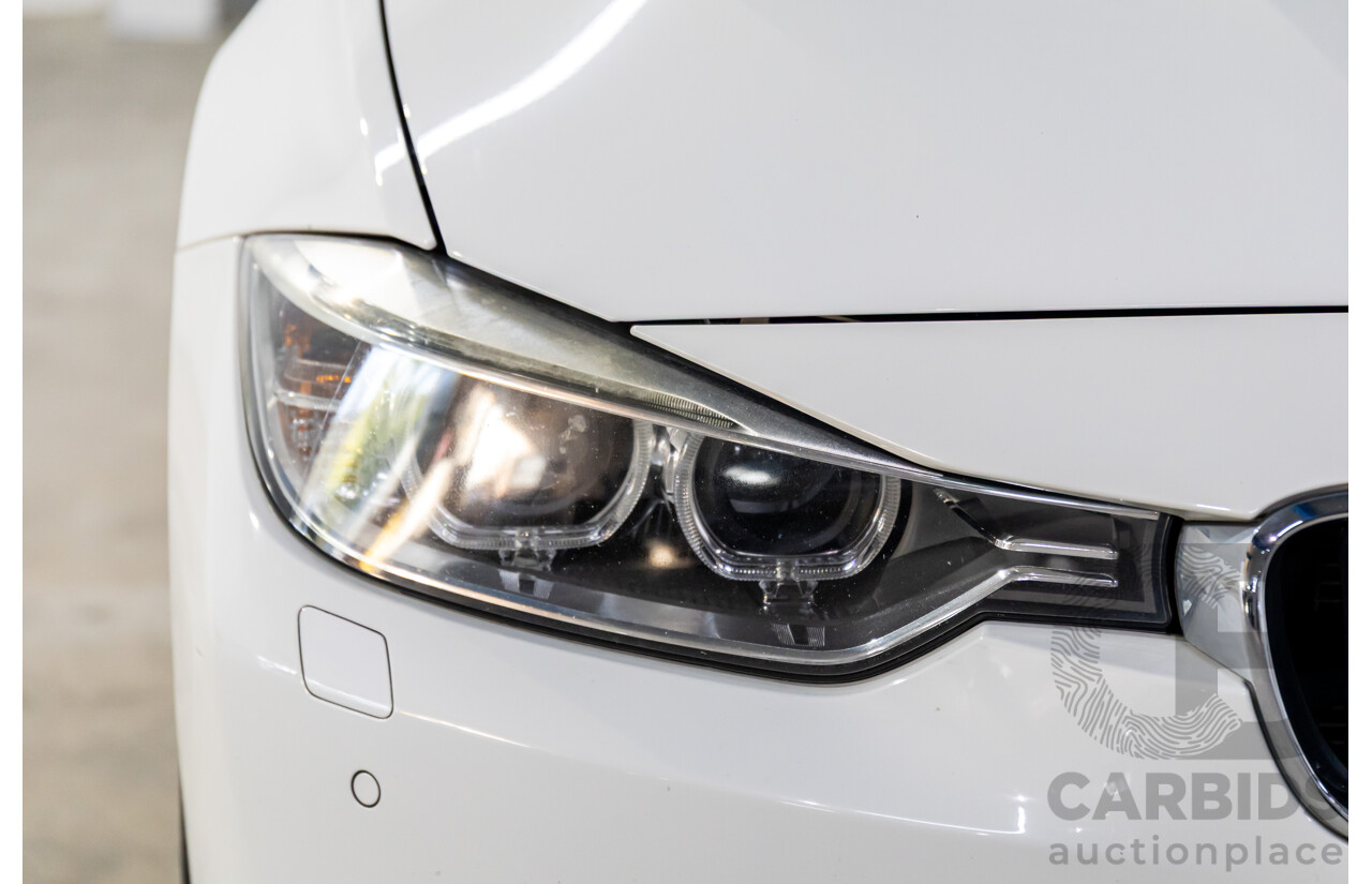 2/2013 BMW 328i Sport Line F30 MY13.5 4d Sedan Alpine White 2.0L