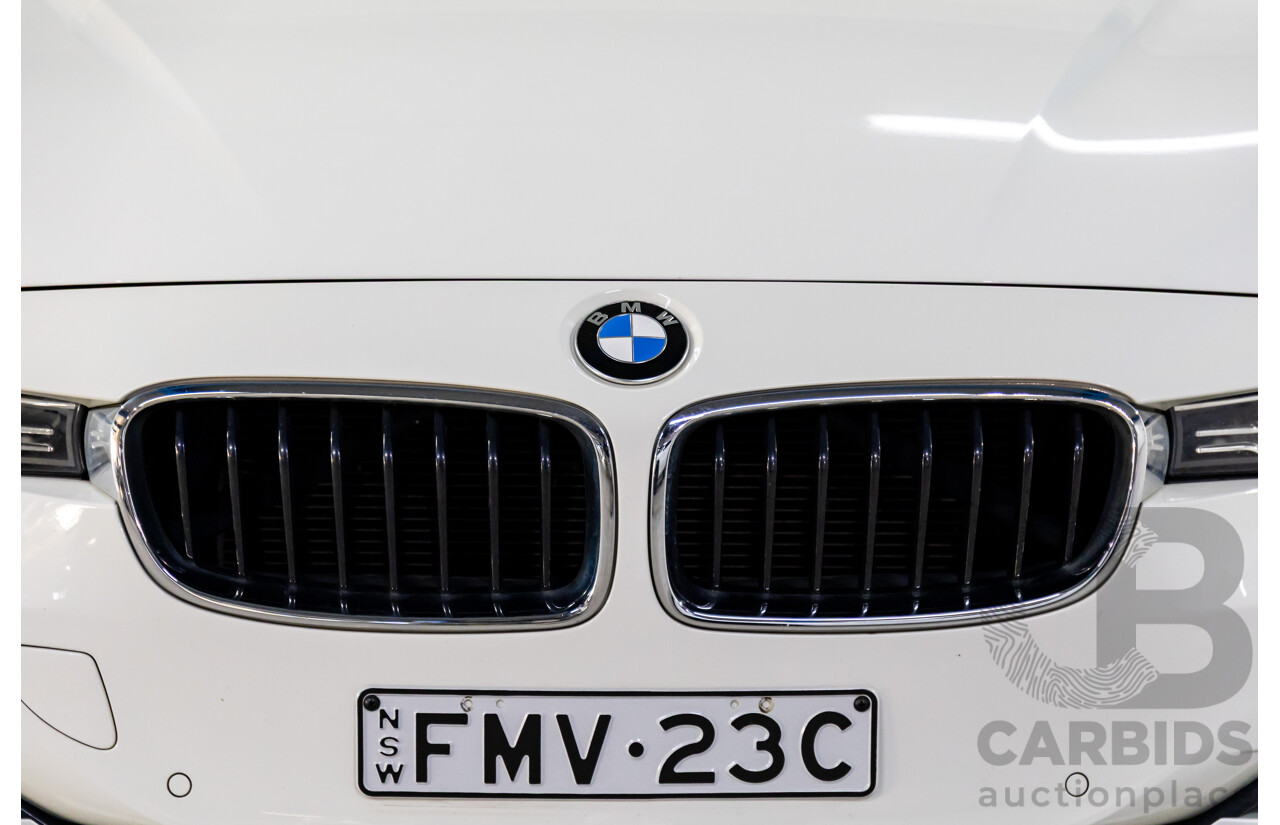 2/2013 BMW 328i Sport Line F30 MY13.5 4d Sedan Alpine White 2.0L