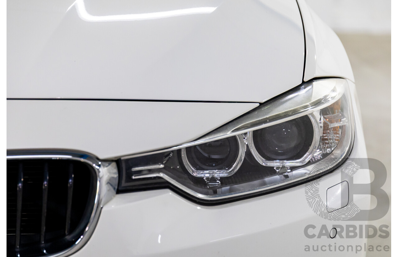 2/2013 BMW 328i Sport Line F30 MY13.5 4d Sedan Alpine White 2.0L