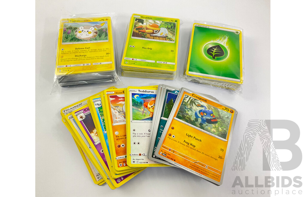 Collection of Pokemon Cards Including Energy, Trainer and Basics