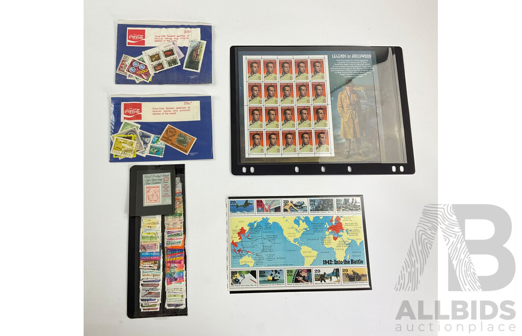 USA Mint Stamp Sheet, Legends of Hollywood, Humphry Bogart, 1942: Into the Battle Mint Stamp Strips, Two Coca Cola Bottlers Selection of Pictorial Stamps of the World, Collection of Hong Kong Stamps, Cocos Island 25 Anniversary 1st Definitive Issue