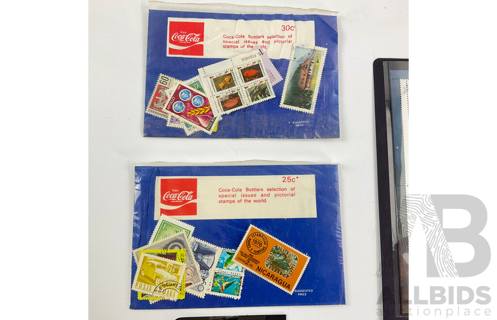 USA Mint Stamp Sheet, Legends of Hollywood, Humphry Bogart, 1942: Into the Battle Mint Stamp Strips, Two Coca Cola Bottlers Selection of Pictorial Stamps of the World, Collection of Hong Kong Stamps, Cocos Island 25 Anniversary 1st Definitive Issue