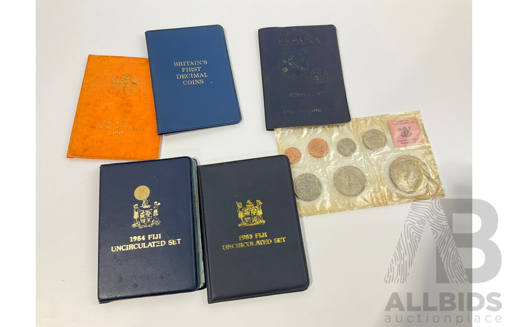 Seven UNC Coin Sets Including Britains First Decimal Coins, Japan Mint Breau, New Zealand 1967, Spain 1980,  Fiji 1983 and 1984