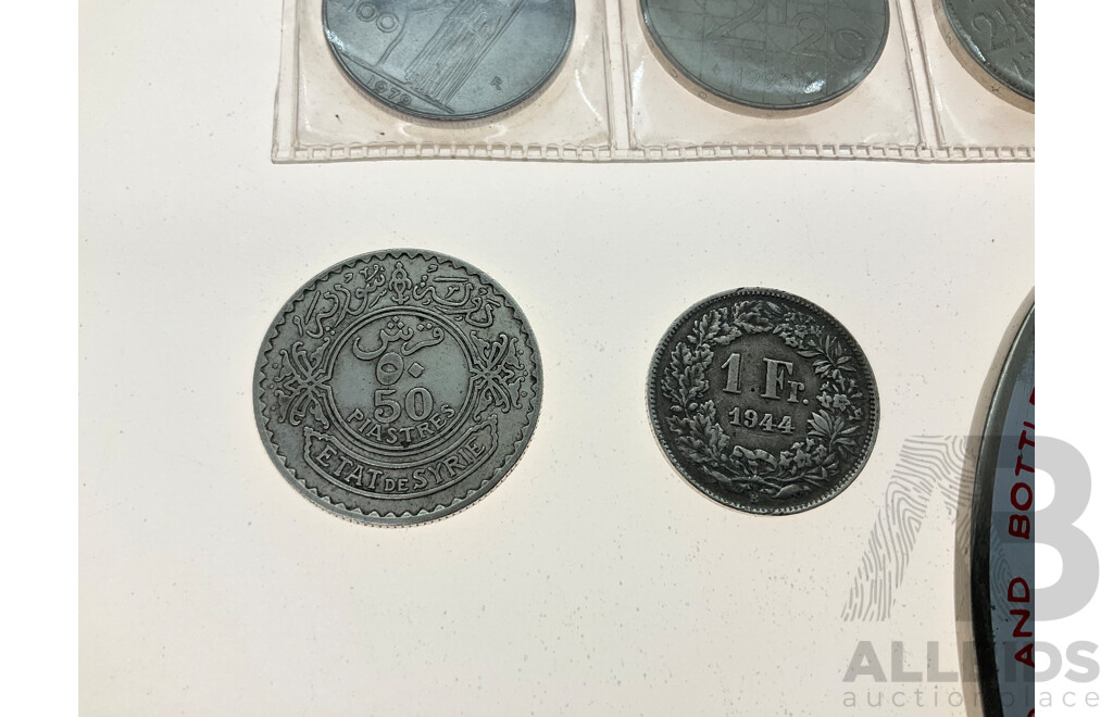Syria 1936 Silver Fifty Piastres Coin, Switzerland 1944 Silver One Franc, Italy 1975, 1979 One Hundred Lire, Netherlands 1972, 1993 Two and Half Gulden, France 1949 Two Francs,  Heineken Bottle Opener
