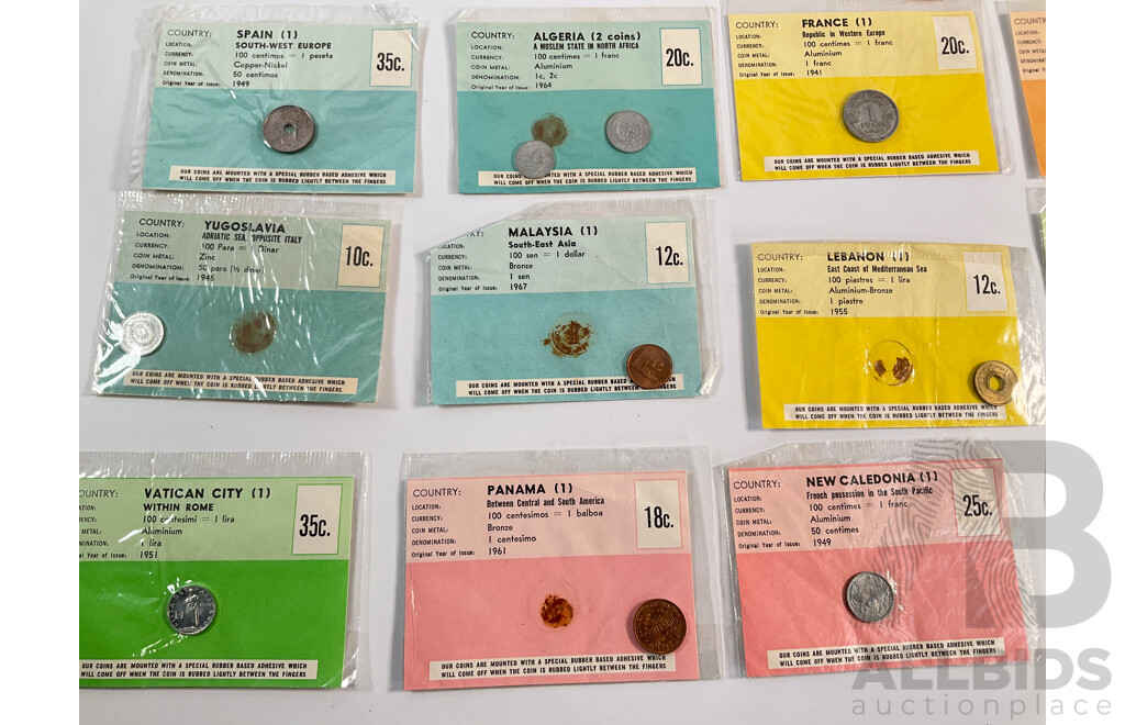 Collection of Vintage International Carded Coins, Chinese Confucius Medallion Two Singapore Sir Thomas Raffles Medallions, Two Papua New Guinea 1998 Fifty Toea Coins, Bank of PNG Silver Jubilee