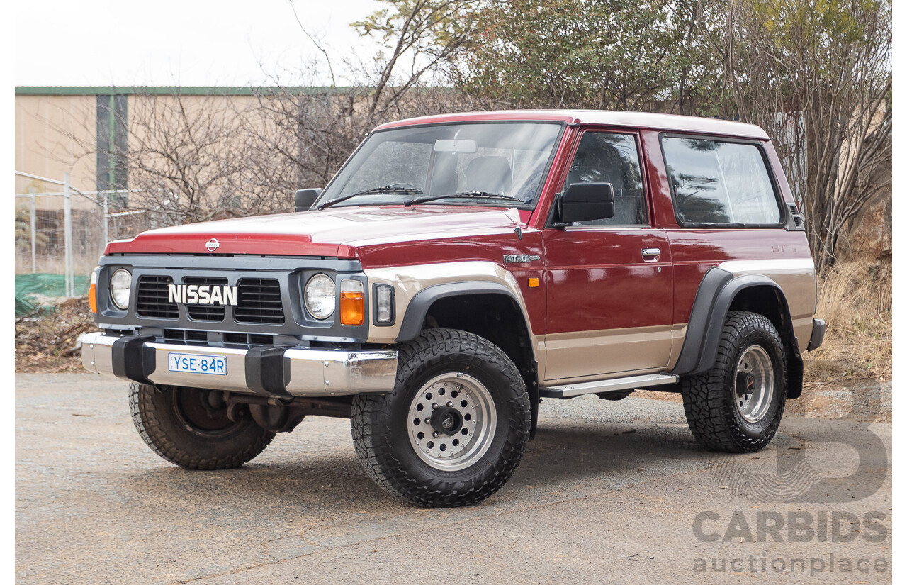 10/1994 Nissan Patrol ST SWB Series 2 (4x4) KY60 GQ 2d Hardtop Big Red / Desert Sand 4.2L