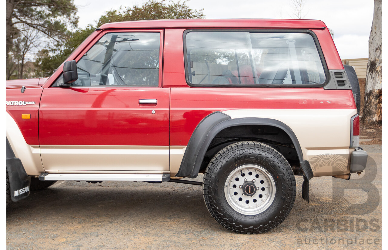 10/1994 Nissan Patrol ST SWB Series 2 (4x4) KY60 GQ 2d Hardtop Big Red / Desert Sand 4.2L
