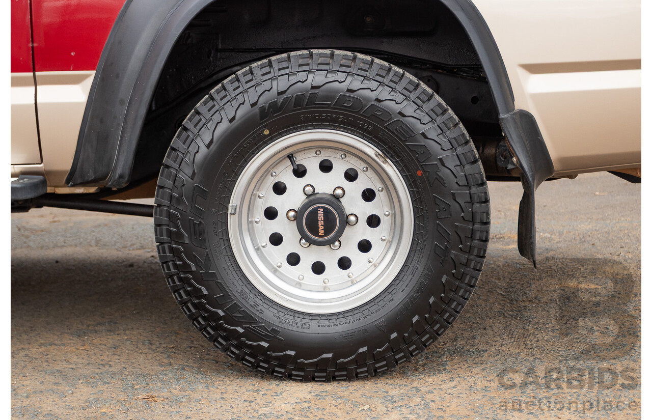 10/1994 Nissan Patrol ST SWB Series 2 (4x4) KY60 GQ 2d Hardtop Big Red / Desert Sand 4.2L