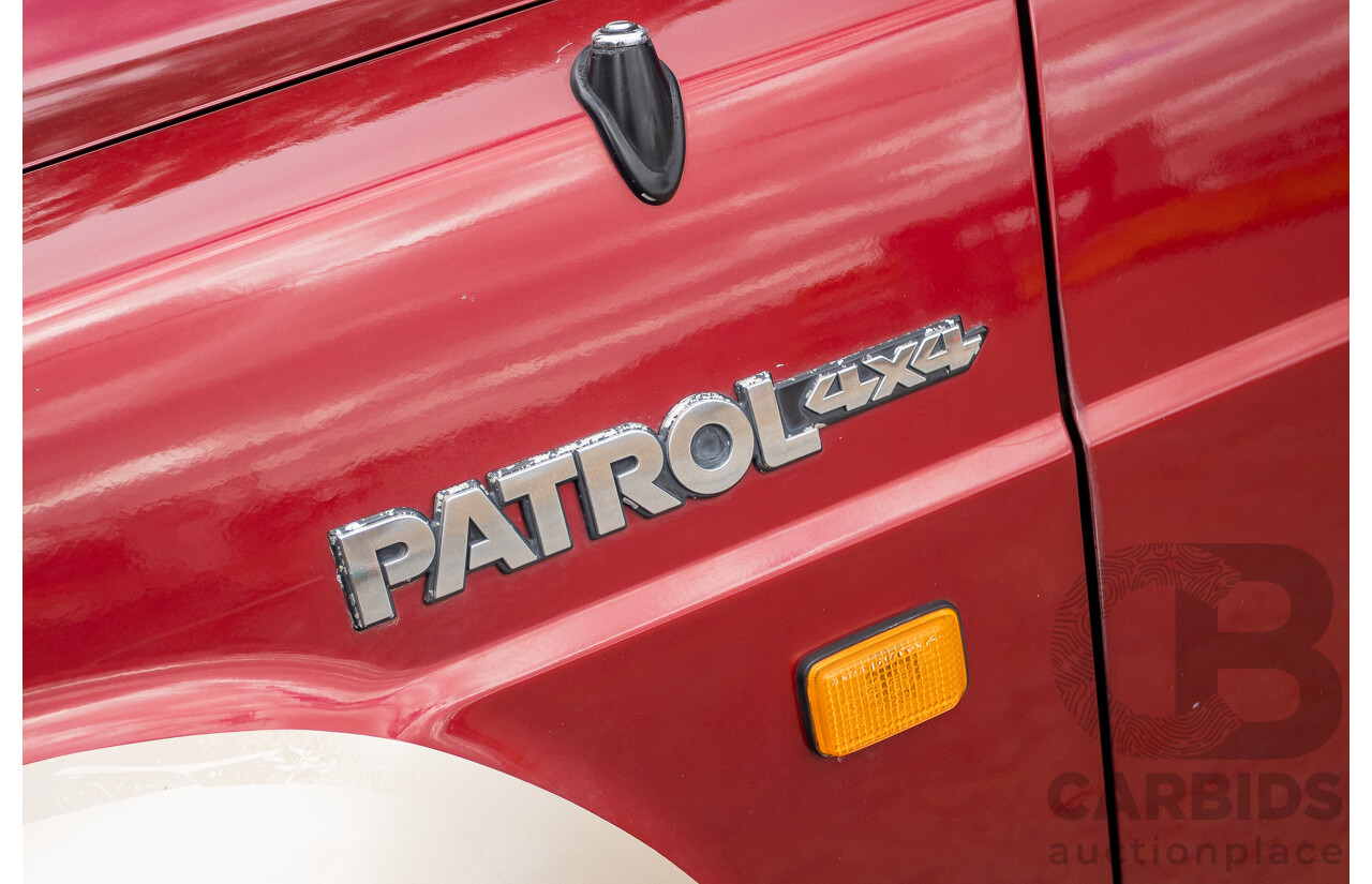 10/1994 Nissan Patrol ST SWB Series 2 (4x4) KY60 GQ 2d Hardtop Big Red / Desert Sand 4.2L