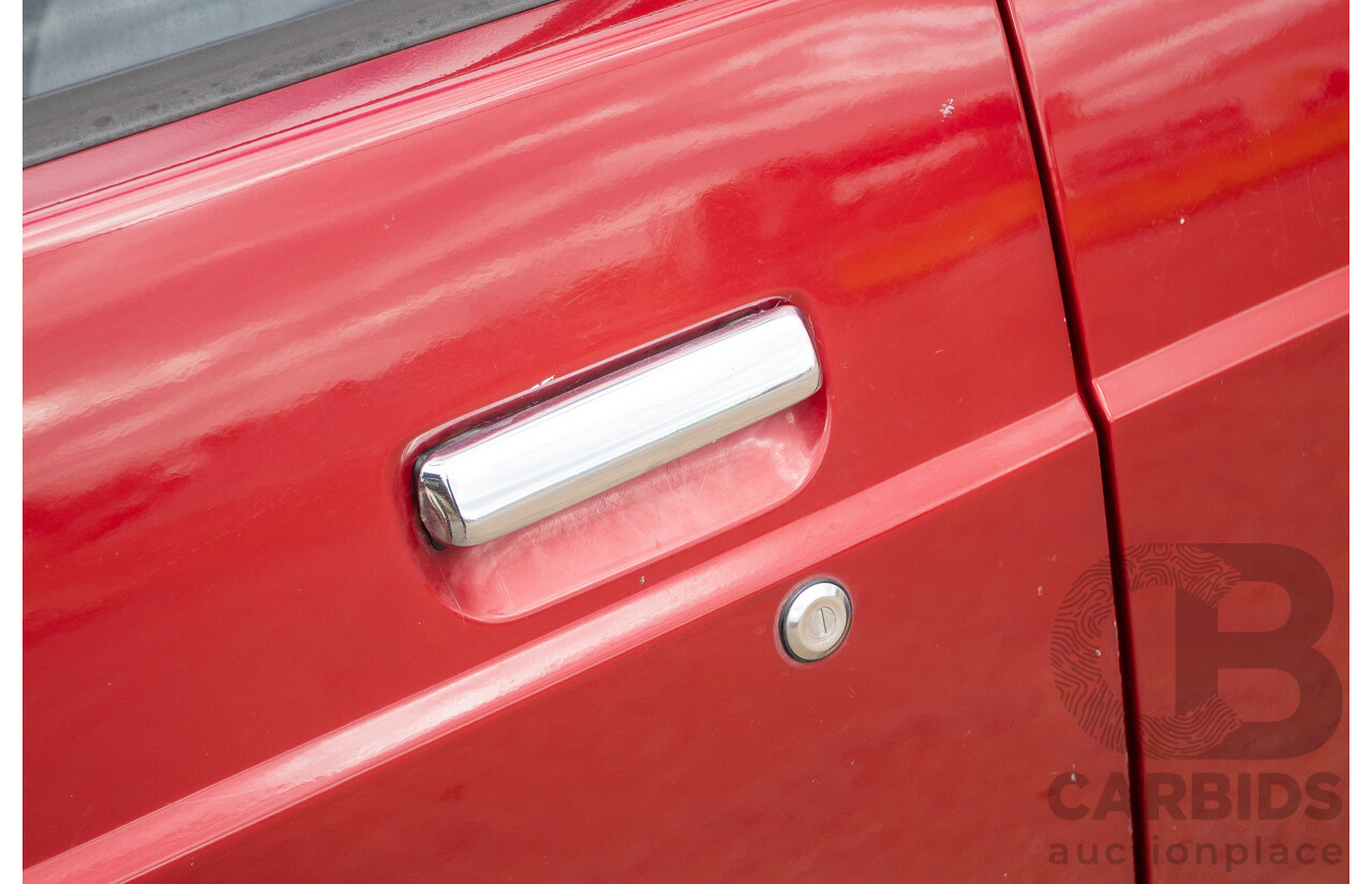 10/1994 Nissan Patrol ST SWB Series 2 (4x4) KY60 GQ 2d Hardtop Big Red / Desert Sand 4.2L