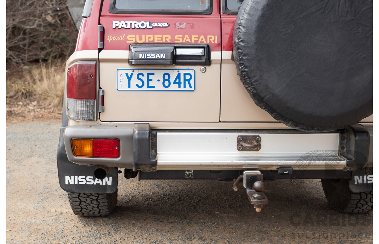 10/1994 Nissan Patrol ST SWB Series 2 (4x4) KY60 GQ 2d Hardtop Big Red / Desert Sand 4.2L