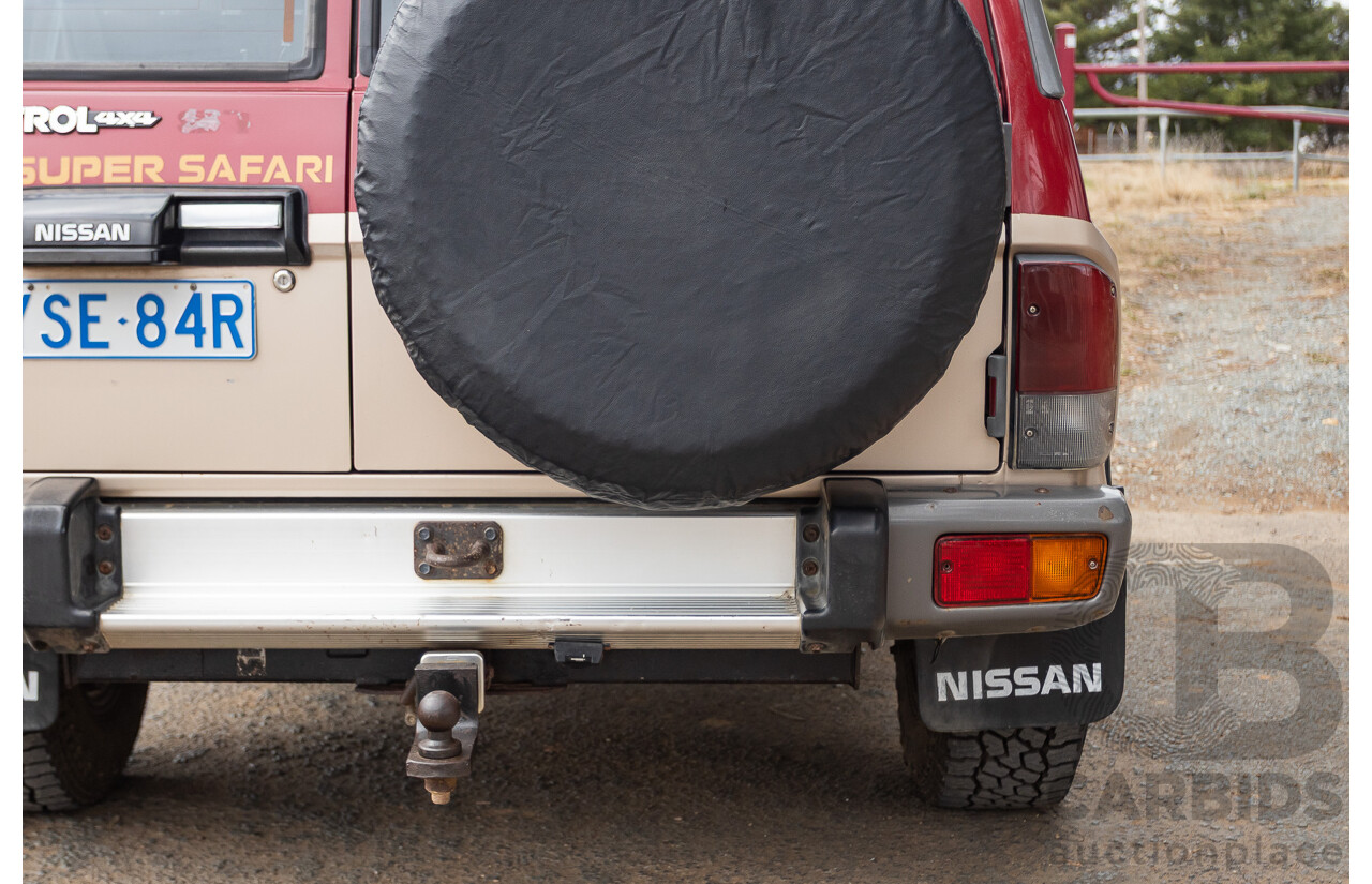 10/1994 Nissan Patrol ST SWB Series 2 (4x4) KY60 GQ 2d Hardtop Big Red / Desert Sand 4.2L