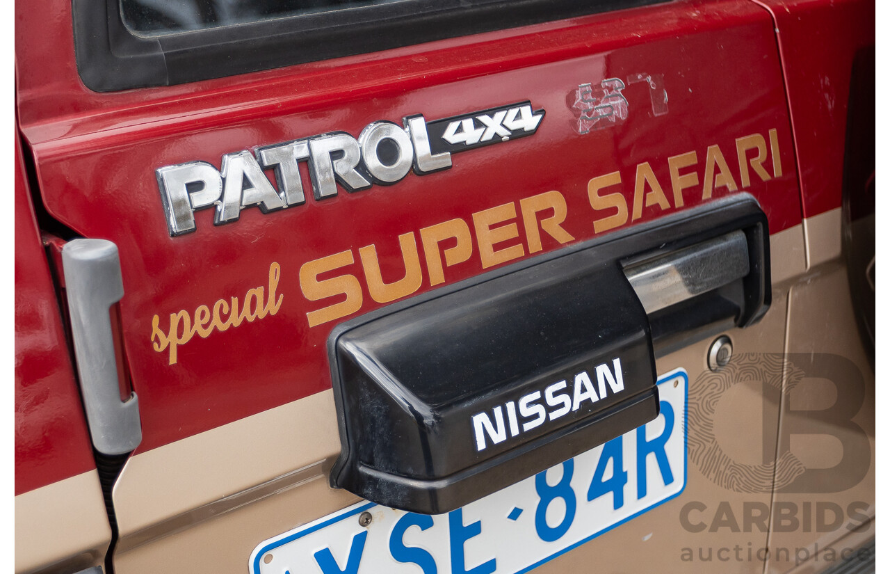 10/1994 Nissan Patrol ST SWB Series 2 (4x4) KY60 GQ 2d Hardtop Big Red / Desert Sand 4.2L