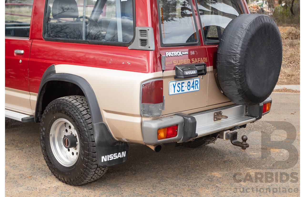 10/1994 Nissan Patrol ST SWB Series 2 (4x4) KY60 GQ 2d Hardtop Big Red / Desert Sand 4.2L