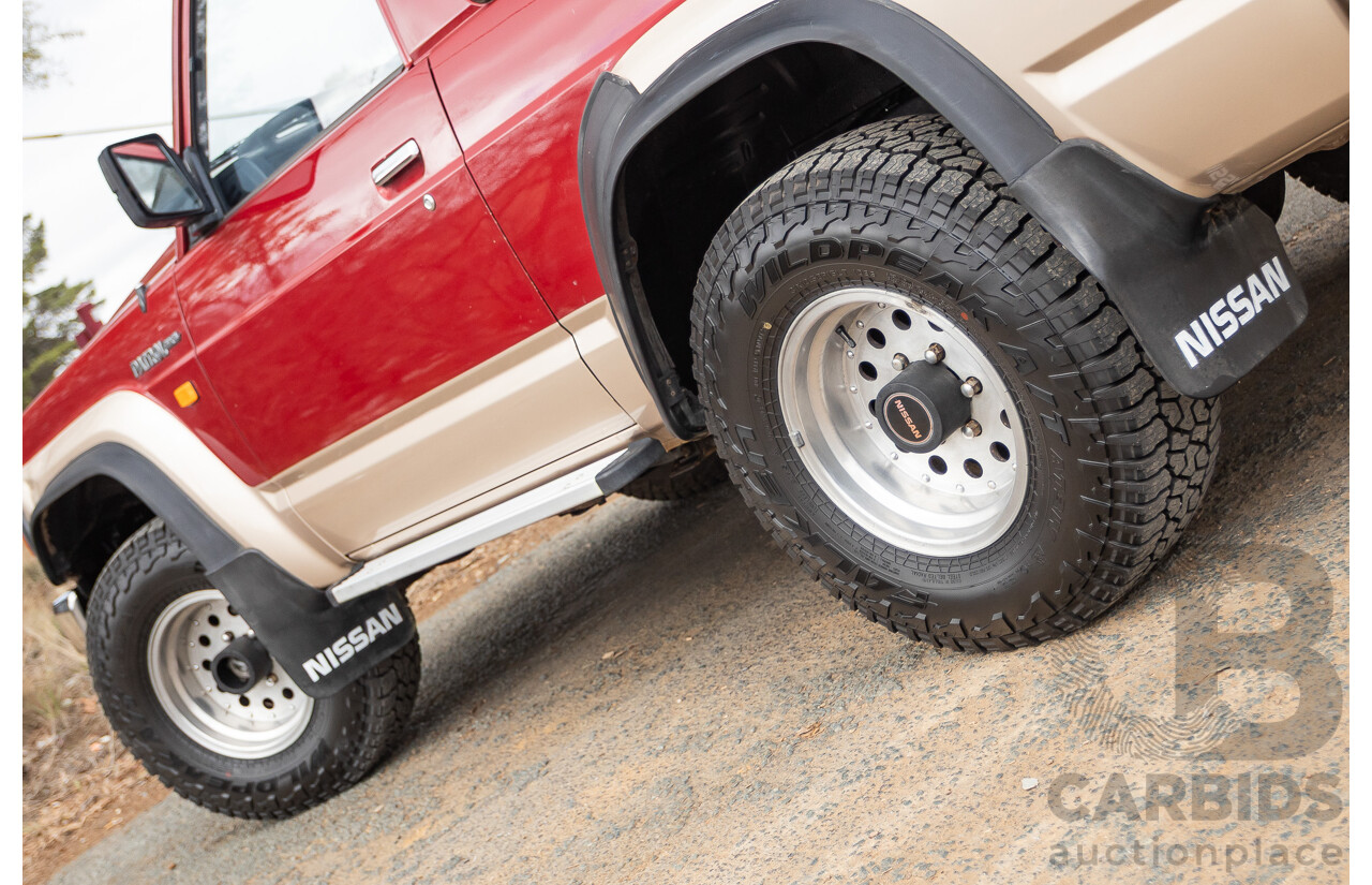 10/1994 Nissan Patrol ST SWB Series 2 (4x4) KY60 GQ 2d Hardtop Big Red / Desert Sand 4.2L