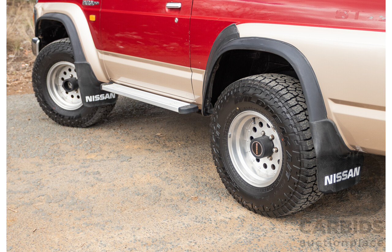 10/1994 Nissan Patrol ST SWB Series 2 (4x4) KY60 GQ 2d Hardtop Big Red / Desert Sand 4.2L