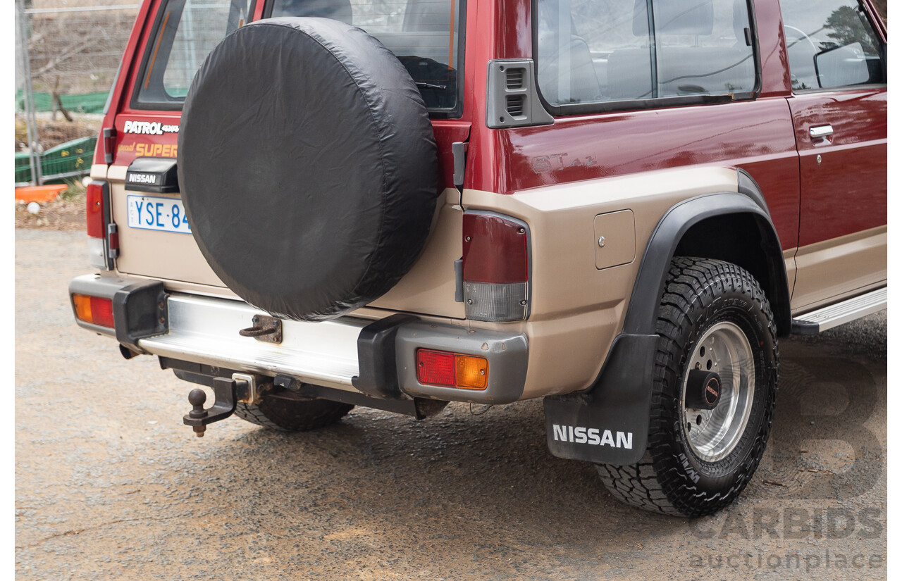 10/1994 Nissan Patrol ST SWB Series 2 (4x4) KY60 GQ 2d Hardtop Big Red / Desert Sand 4.2L