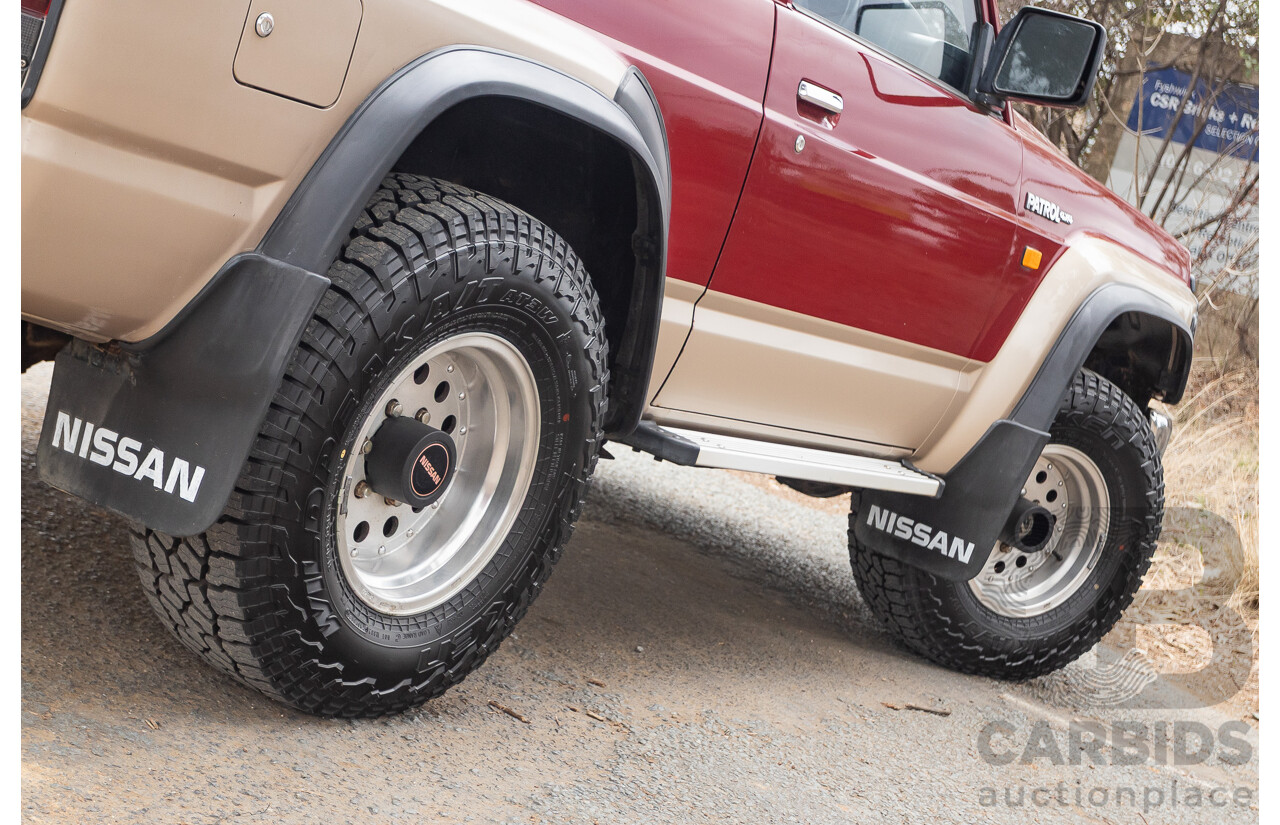 10/1994 Nissan Patrol ST SWB Series 2 (4x4) KY60 GQ 2d Hardtop Big Red / Desert Sand 4.2L