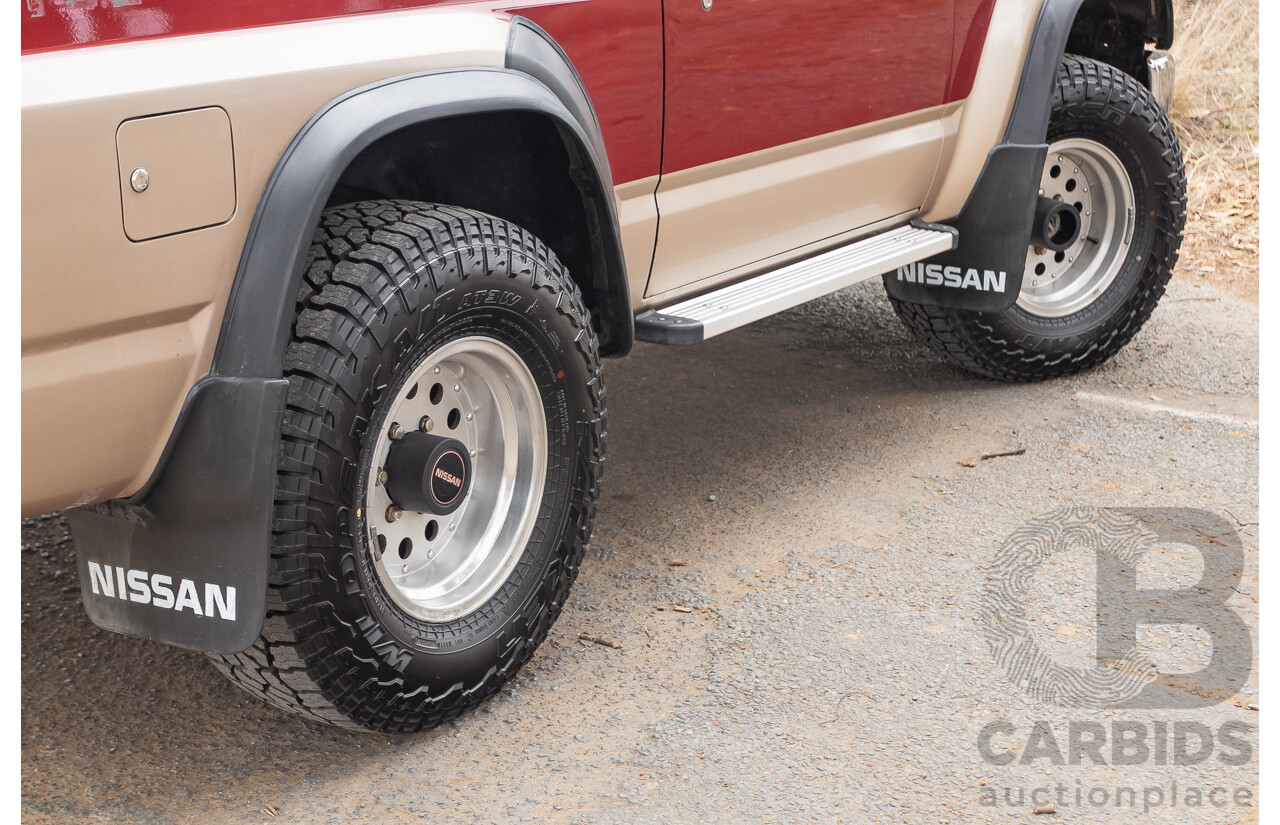 10/1994 Nissan Patrol ST SWB Series 2 (4x4) KY60 GQ 2d Hardtop Big Red / Desert Sand 4.2L