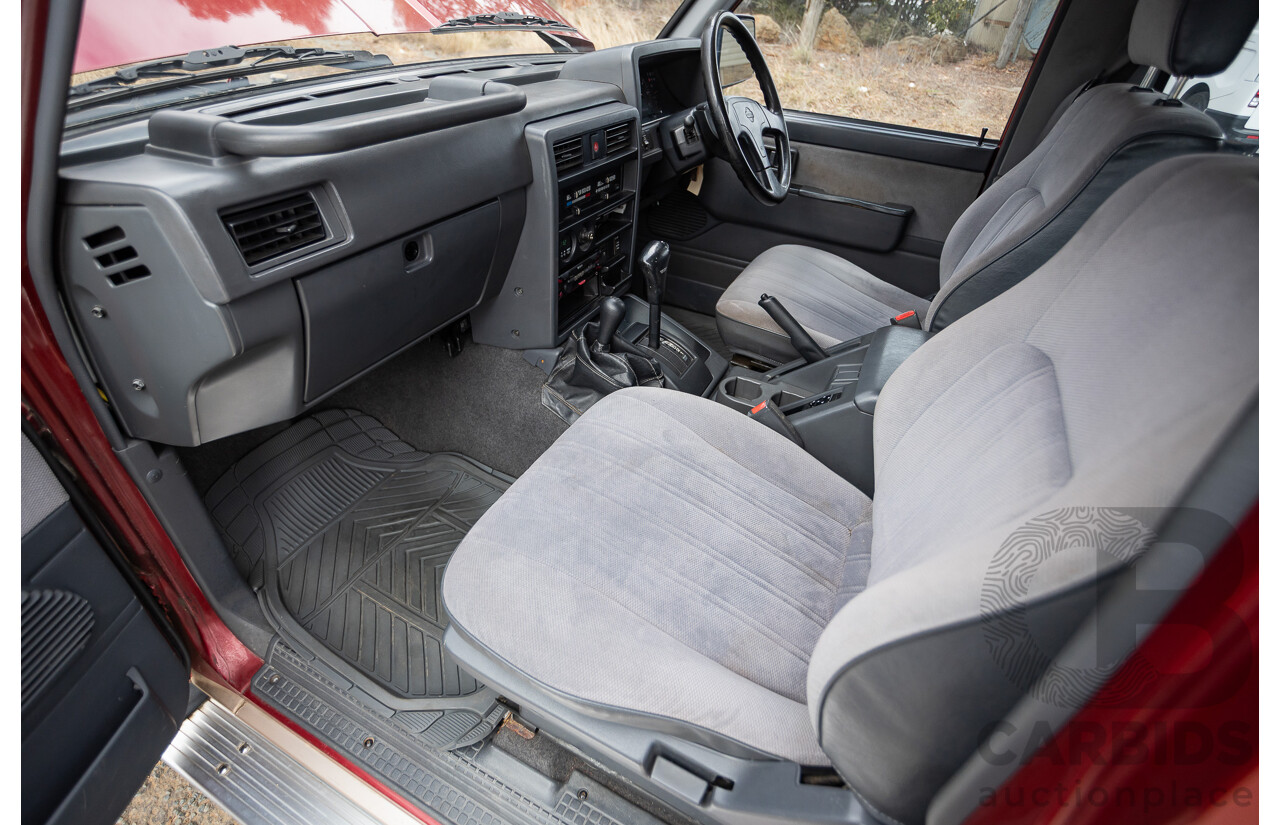 10/1994 Nissan Patrol ST SWB Series 2 (4x4) KY60 GQ 2d Hardtop Big Red / Desert Sand 4.2L