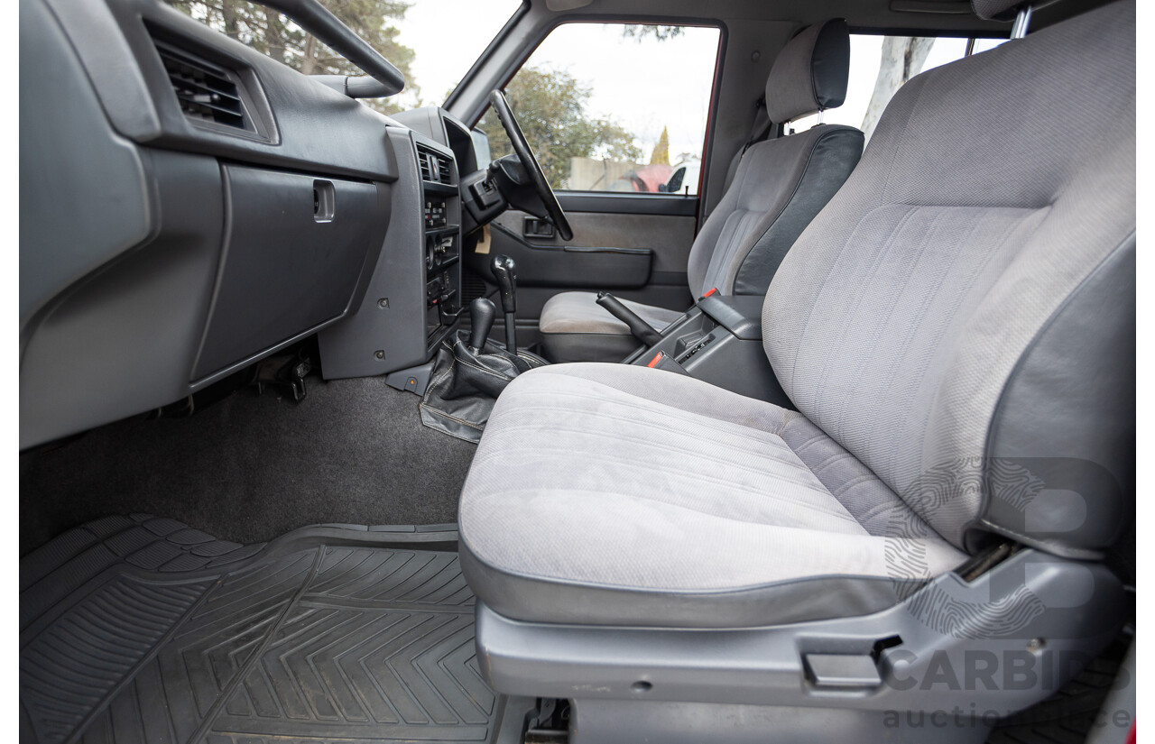 10/1994 Nissan Patrol ST SWB Series 2 (4x4) KY60 GQ 2d Hardtop Big Red / Desert Sand 4.2L