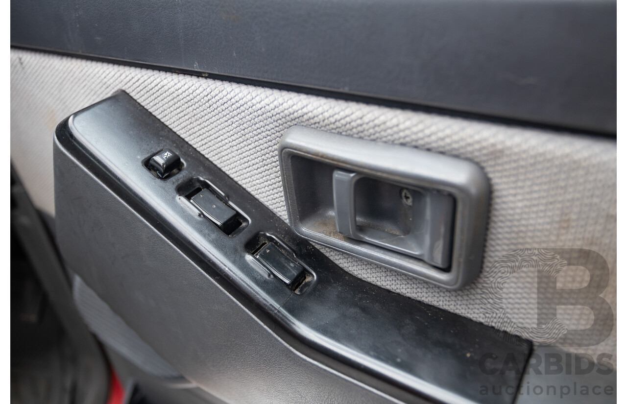 10/1994 Nissan Patrol ST SWB Series 2 (4x4) KY60 GQ 2d Hardtop Big Red / Desert Sand 4.2L