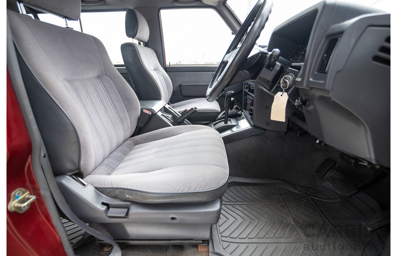 10/1994 Nissan Patrol ST SWB Series 2 (4x4) KY60 GQ 2d Hardtop Big Red / Desert Sand 4.2L