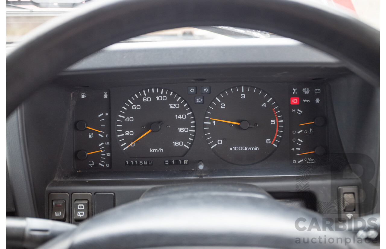 10/1994 Nissan Patrol ST SWB Series 2 (4x4) KY60 GQ 2d Hardtop Big Red / Desert Sand 4.2L