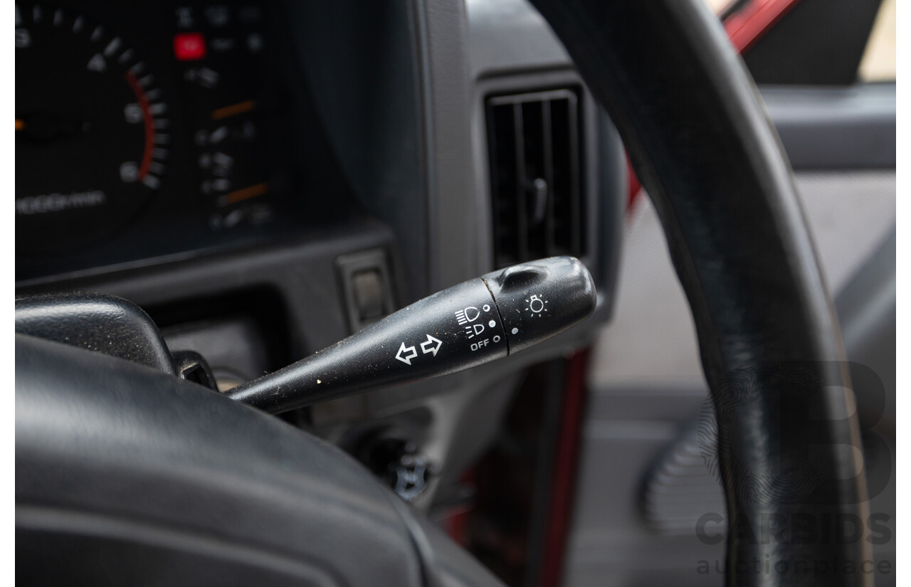 10/1994 Nissan Patrol ST SWB Series 2 (4x4) KY60 GQ 2d Hardtop Big Red / Desert Sand 4.2L