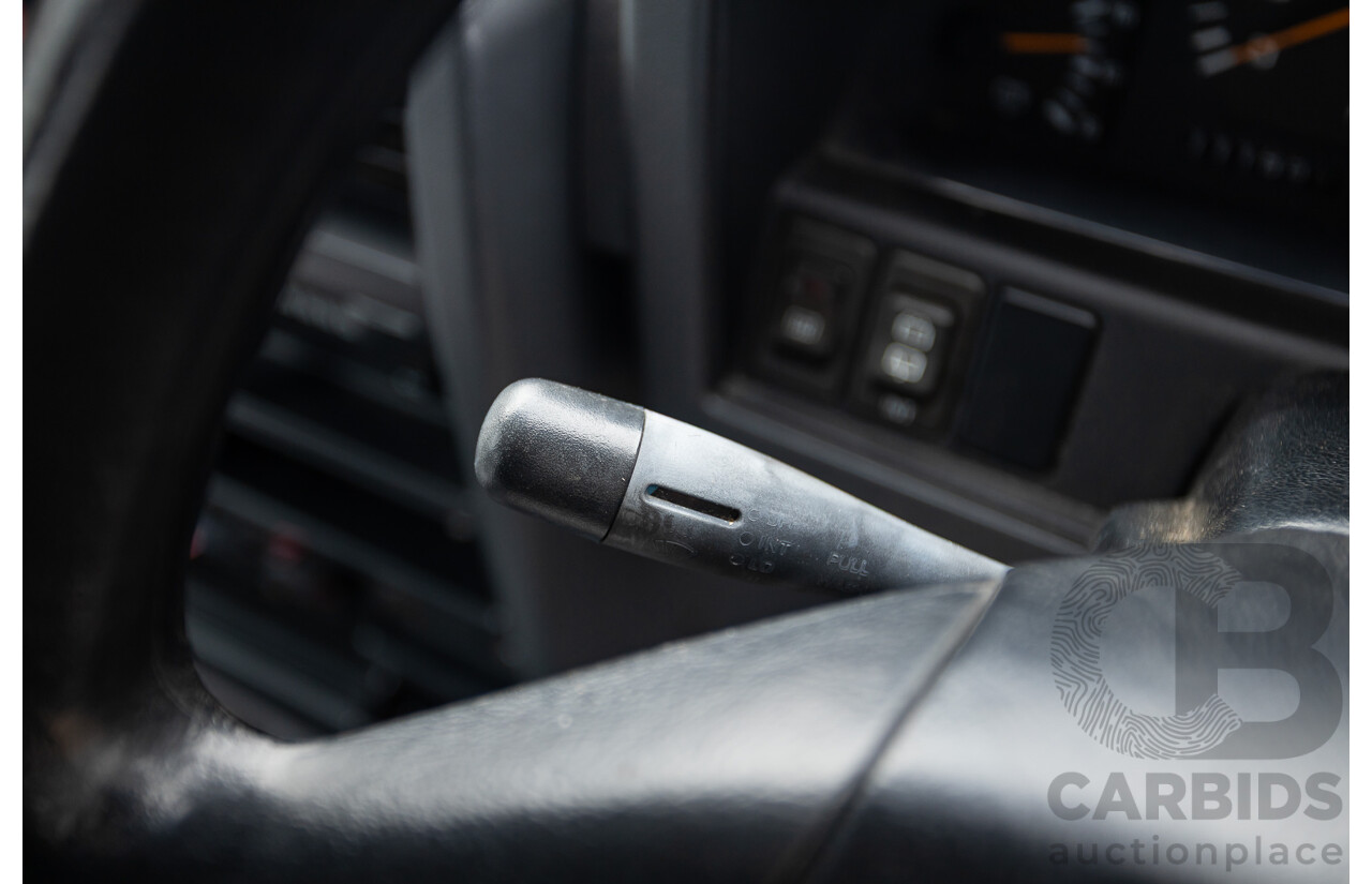 10/1994 Nissan Patrol ST SWB Series 2 (4x4) KY60 GQ 2d Hardtop Big Red / Desert Sand 4.2L