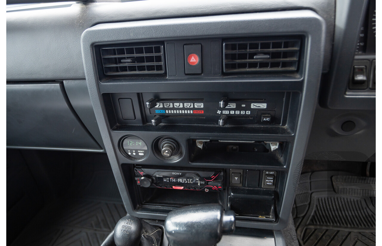 10/1994 Nissan Patrol ST SWB Series 2 (4x4) KY60 GQ 2d Hardtop Big Red / Desert Sand 4.2L