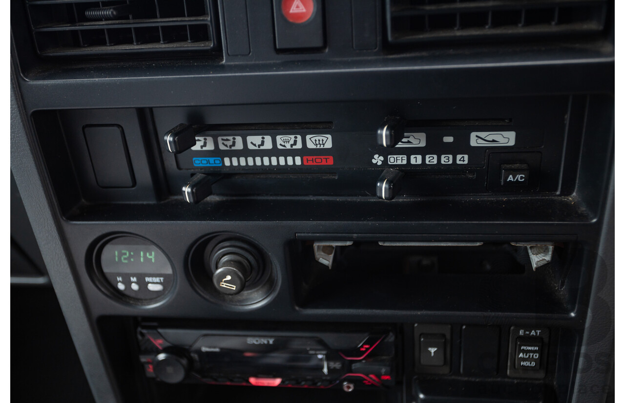 10/1994 Nissan Patrol ST SWB Series 2 (4x4) KY60 GQ 2d Hardtop Big Red / Desert Sand 4.2L