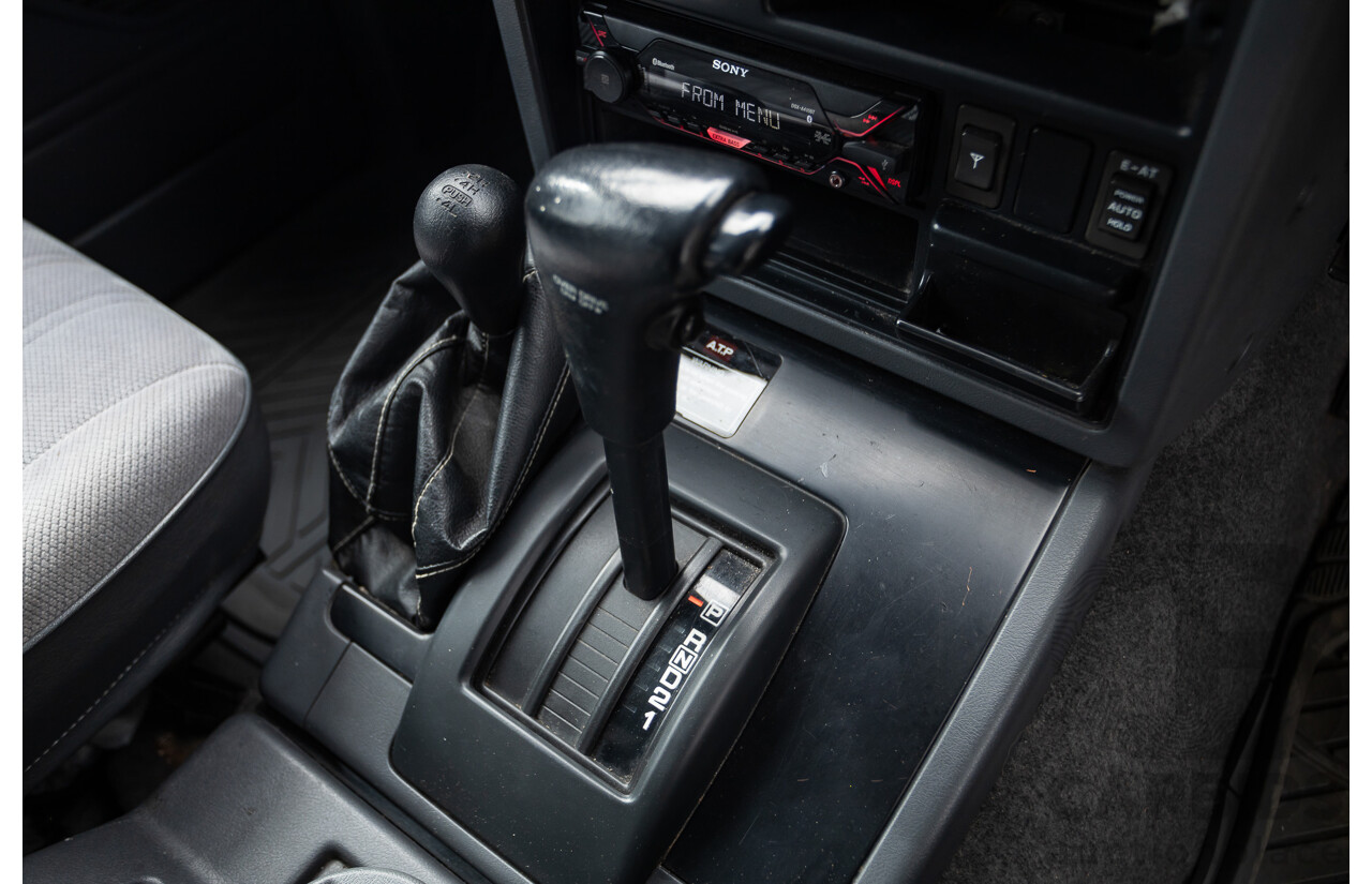 10/1994 Nissan Patrol ST SWB Series 2 (4x4) KY60 GQ 2d Hardtop Big Red / Desert Sand 4.2L