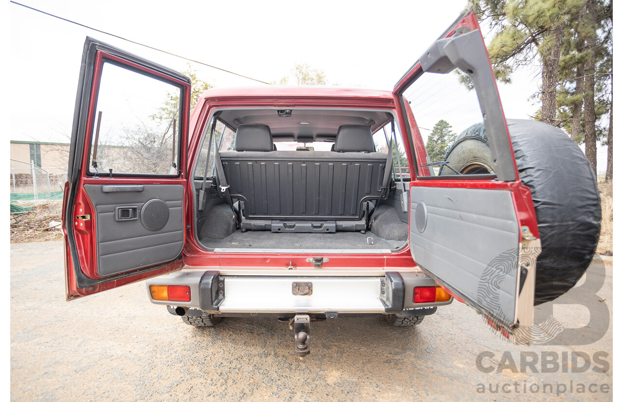 10/1994 Nissan Patrol ST SWB Series 2 (4x4) KY60 GQ 2d Hardtop Big Red / Desert Sand 4.2L