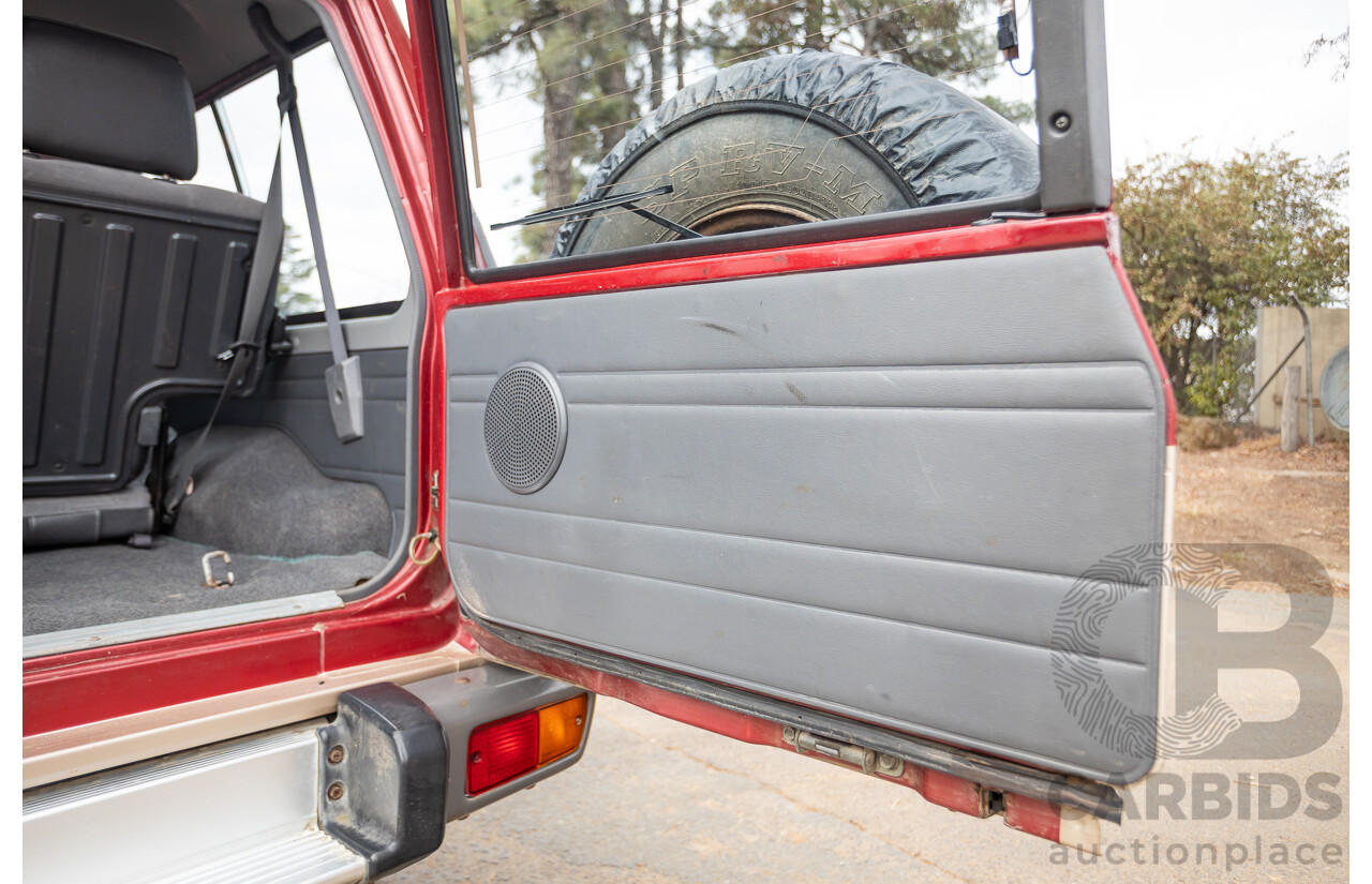 10/1994 Nissan Patrol ST SWB Series 2 (4x4) KY60 GQ 2d Hardtop Big Red / Desert Sand 4.2L