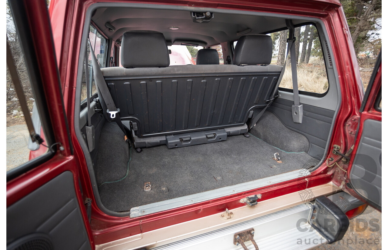 10/1994 Nissan Patrol ST SWB Series 2 (4x4) KY60 GQ 2d Hardtop Big Red / Desert Sand 4.2L