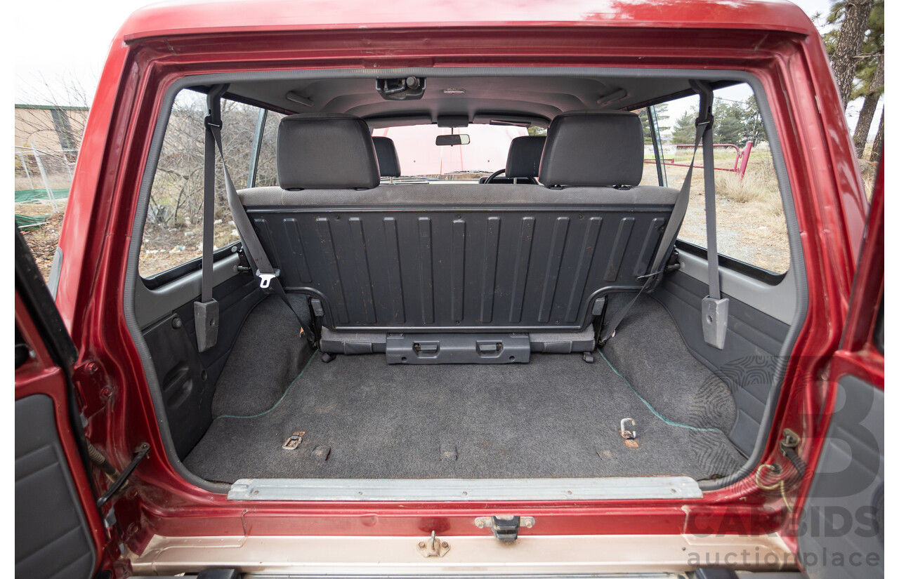 10/1994 Nissan Patrol ST SWB Series 2 (4x4) KY60 GQ 2d Hardtop Big Red / Desert Sand 4.2L