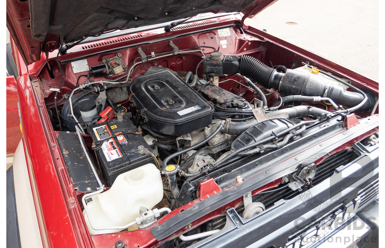 10/1994 Nissan Patrol ST SWB Series 2 (4x4) KY60 GQ 2d Hardtop Big Red / Desert Sand 4.2L