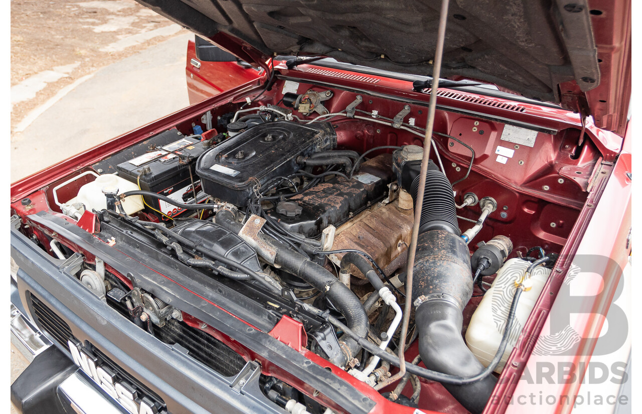 10/1994 Nissan Patrol ST SWB Series 2 (4x4) KY60 GQ 2d Hardtop Big Red / Desert Sand 4.2L