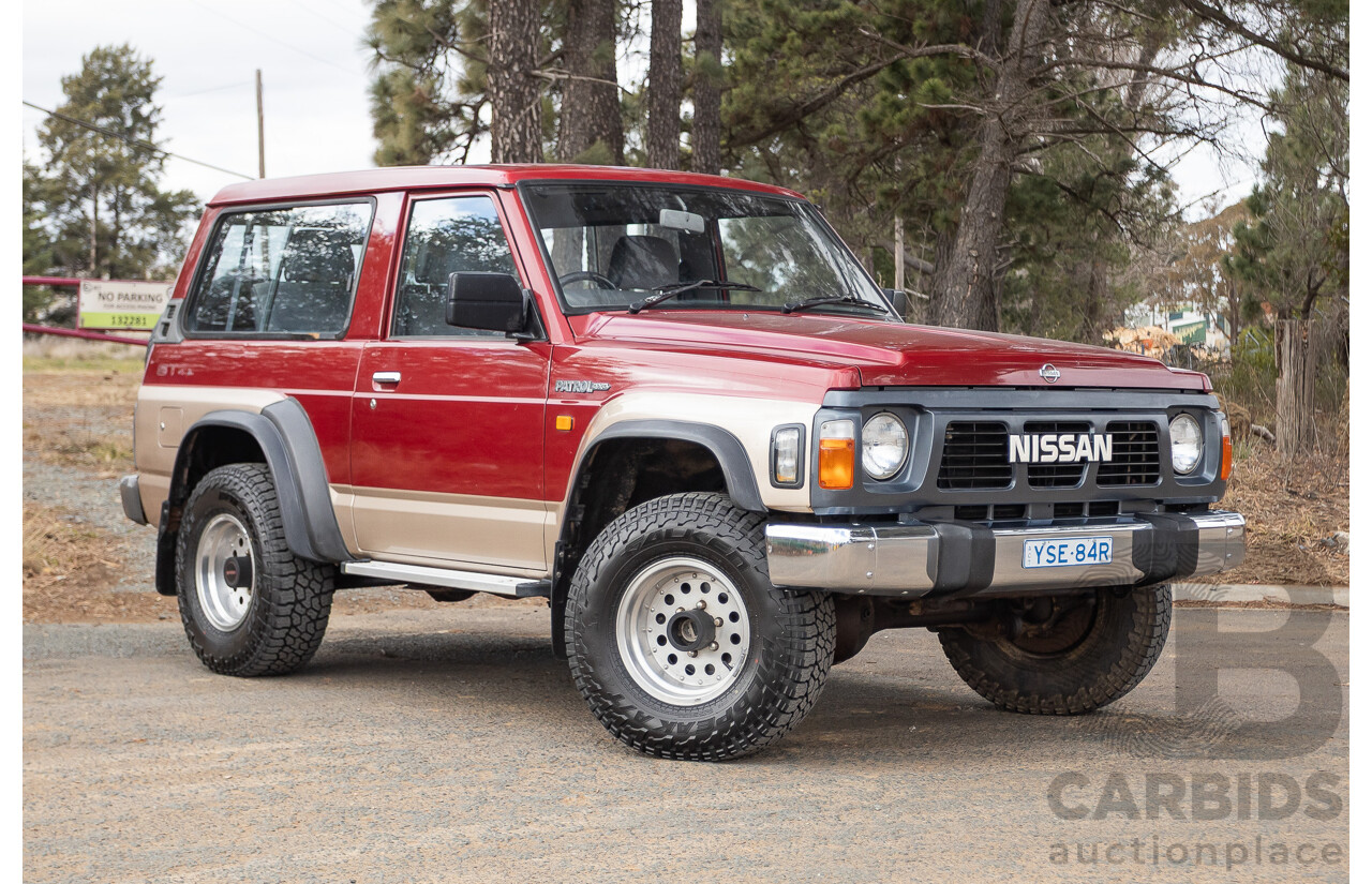 10/1994 Nissan Patrol ST SWB Series 2 (4x4) KY60 GQ 2d Hardtop Big Red / Desert Sand 4.2L
