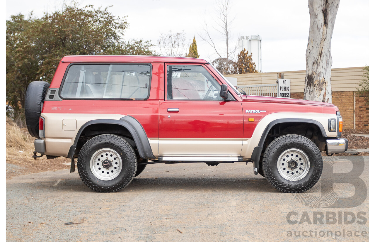 10/1994 Nissan Patrol ST SWB Series 2 (4x4) KY60 GQ 2d Hardtop Big Red / Desert Sand 4.2L