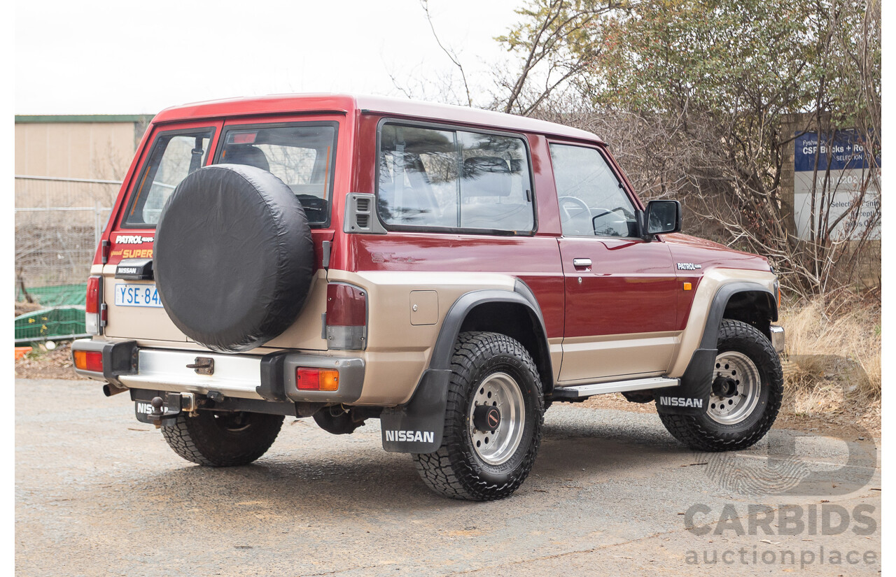 10/1994 Nissan Patrol ST SWB Series 2 (4x4) KY60 GQ 2d Hardtop Big Red / Desert Sand 4.2L
