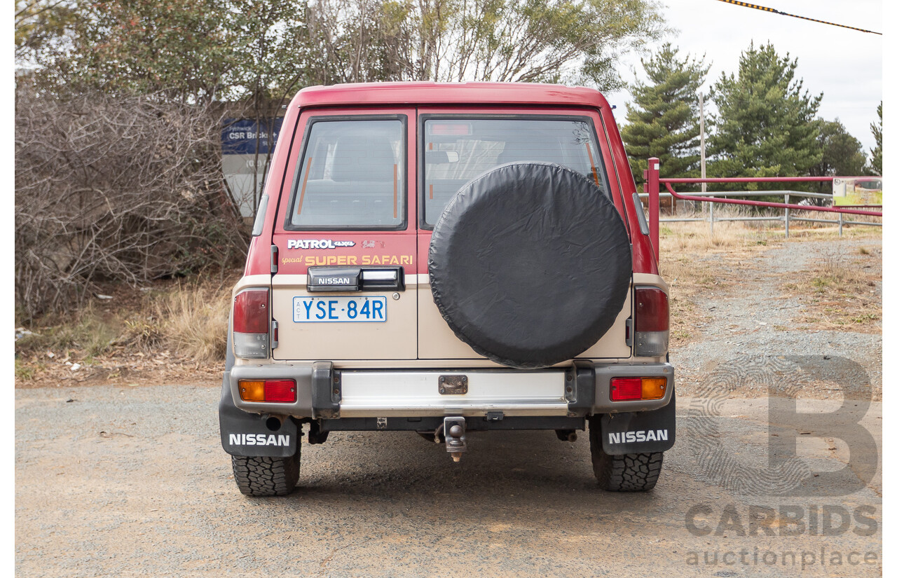 10/1994 Nissan Patrol ST SWB Series 2 (4x4) KY60 GQ 2d Hardtop Big Red / Desert Sand 4.2L